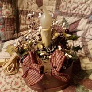 Primitive Electric candle arrangement